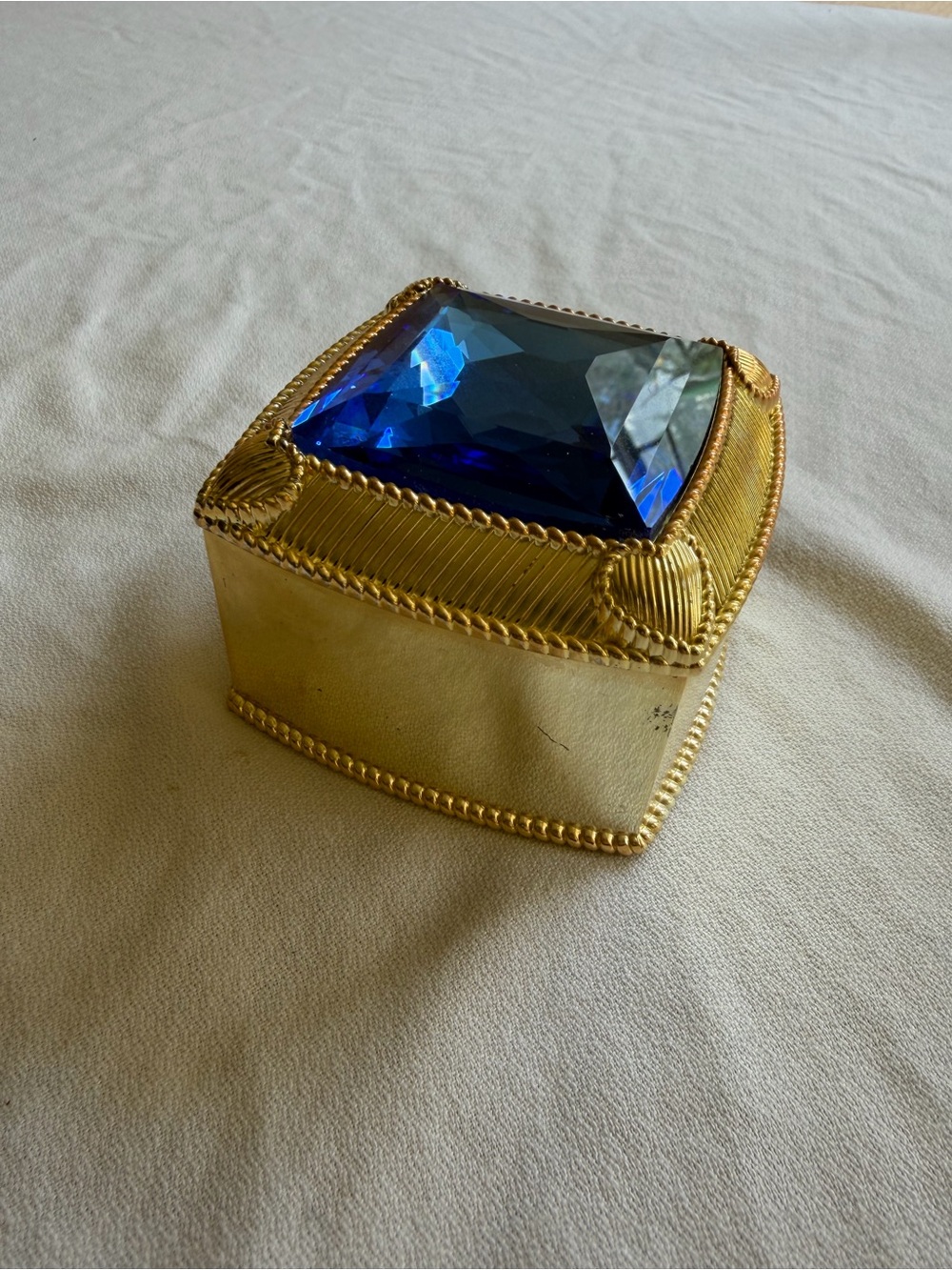 Judith Ripka Gold Trinket Box with Deep Blue Faceted Gem